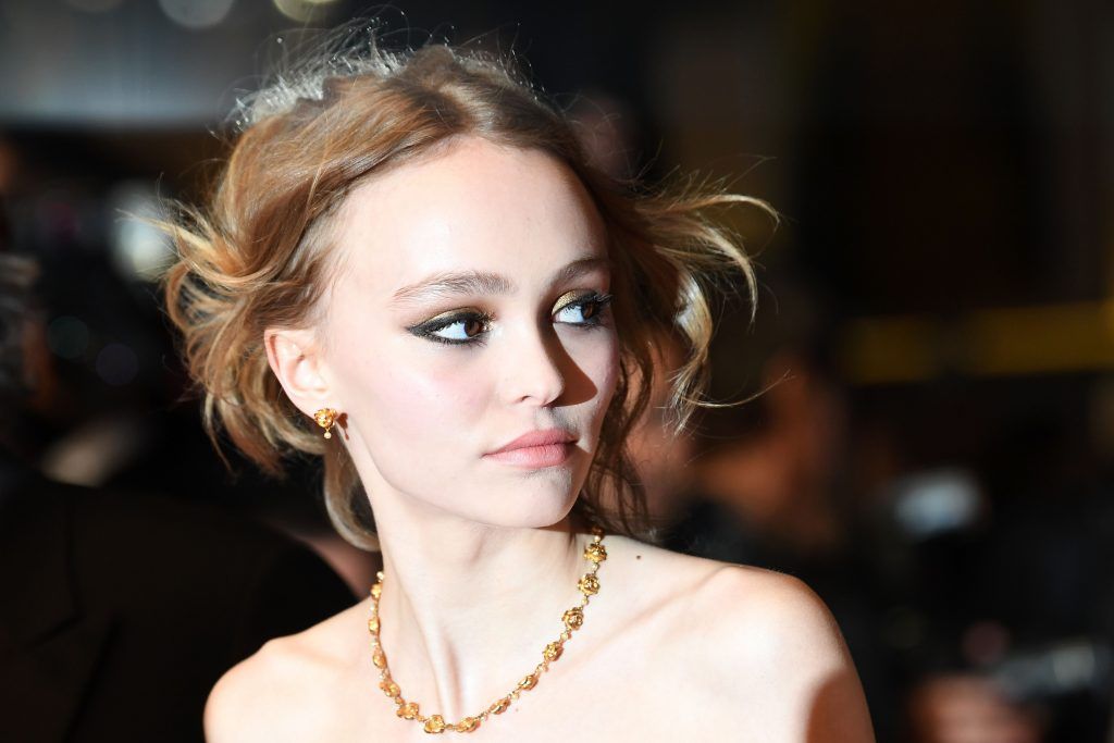 Lily-Rose Depp arrives on May 13, 2016 for the screening of the film "La Danseuse (The Dancer)" at the 69th Cannes Film Festival in Cannes, southern France. (Photo by ANNE-CHRISTINE POUJOULAT/AFP/Getty Images)