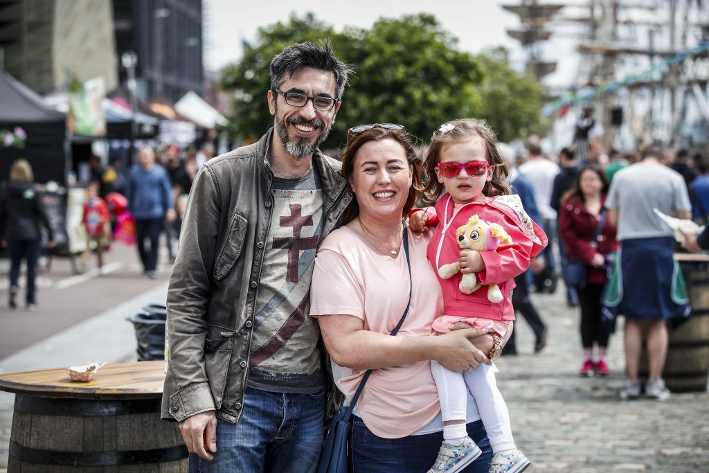 Pictured were Nik and Edel Currie with their daughter Evie (age 2) from Raheny among the thousands of visitors enjoying all the festivities of Dublin Port Riverfest 2017 along Dublin's historic North Wall Quay. Picture: Conor McCabe Photography.