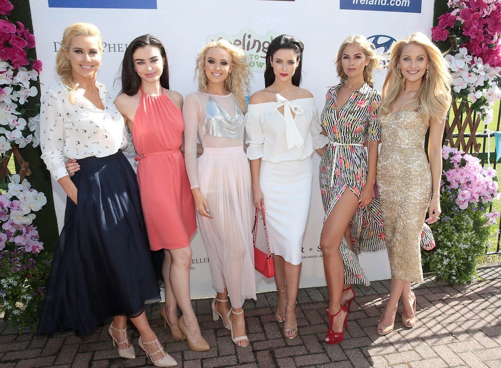 Models Ursula Kelly, Sarah Tansey, Hannah Corcoran, Aoife McGrane, Natalia Petric and Kerri Nicole Blanc  Fiona Fitzsimons and Darren Warren at the June Party in the Park at the Phoenix Park Polo Club to raise funds for the Irish Motor Neurone Disease Association. Picture by Brian McEvoy