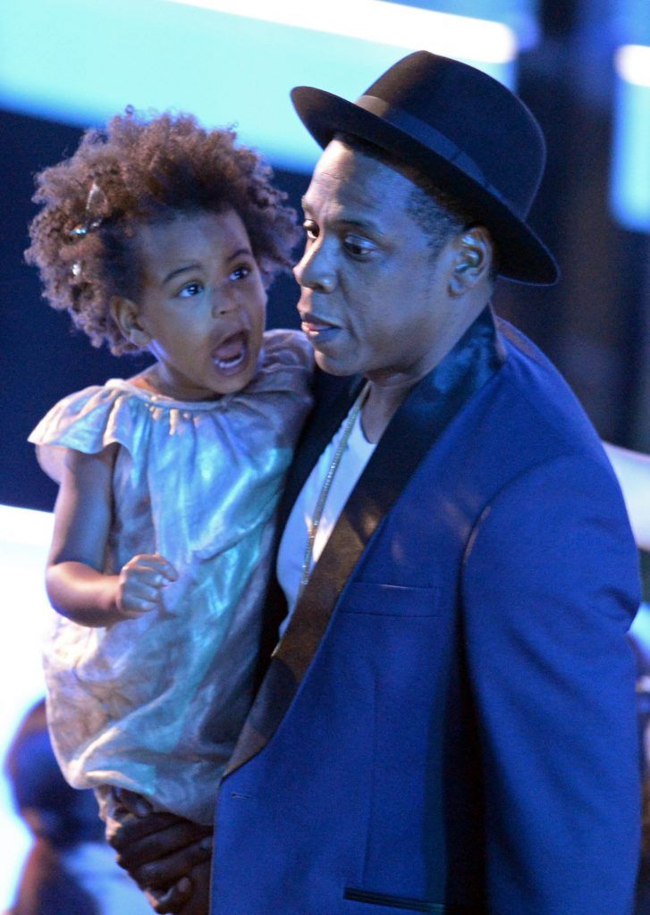 Blue Ivy Carter and Jay-Z appear on stage at the MTV Video Music Awards (VMA), August 24, 2014 at The Forum in Inglewood, California. (Photo by ROBYN BECK/AFP/Getty Images)