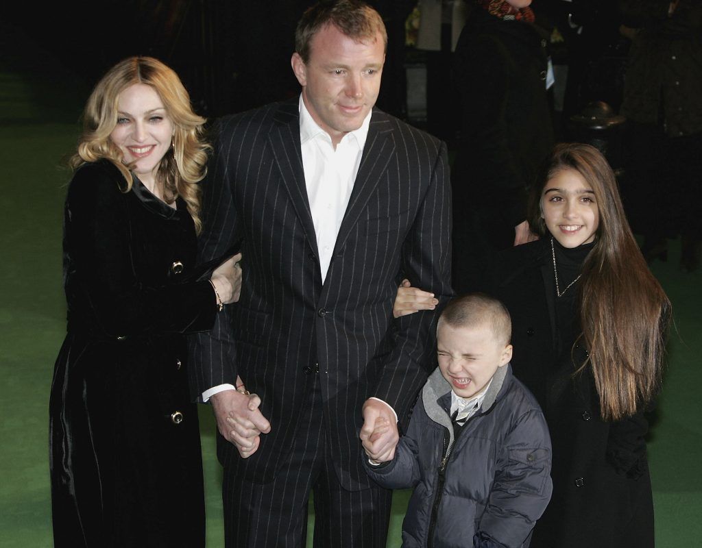 Madonna and husband Guy Ritchie and children Rocco and Lourdes arrive at the Arthur And The Invisibles premier at Vue Leicester Square on January 25, 2007 in London, England.  (Photo by Chris Jackson/Getty Images)