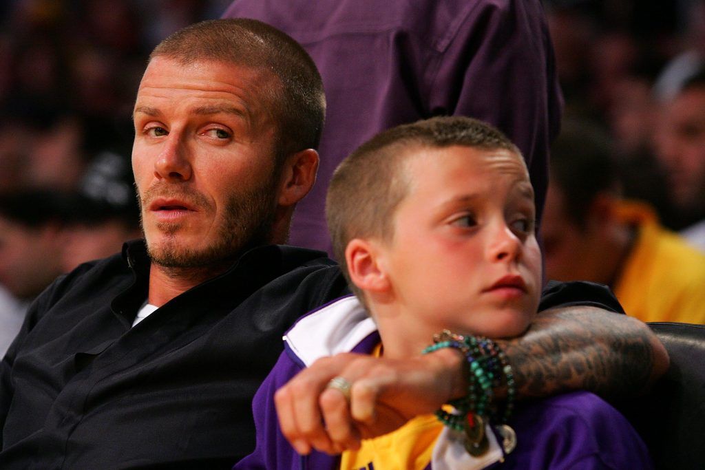 David Beckham and son Brooklyn attend Game Five of the 2008 NBA Finals between the Los Angeles Lakers and the Boston Celtics on June 15, 2008 at Staples Center in Los Angeles, California. (Photo by Lisa Blumenfeld/Getty Images)