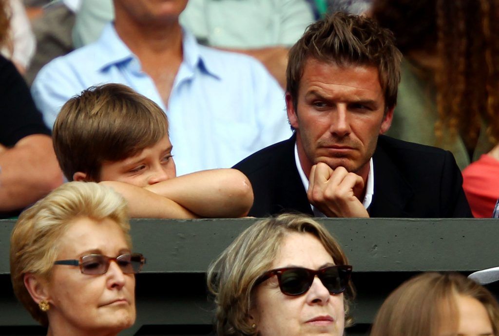 David Beckham and son Brooklyn attend the Semi final match between Andy Murray of Great Britain and Rafael Nadal of Spain on Day Eleven of the Wimbledon Lawn Tennis Championships at the All England Lawn Tennis and Croquet Club on July 2, 2010 in London, England.  (Photo by Julian Finney/Getty Images)