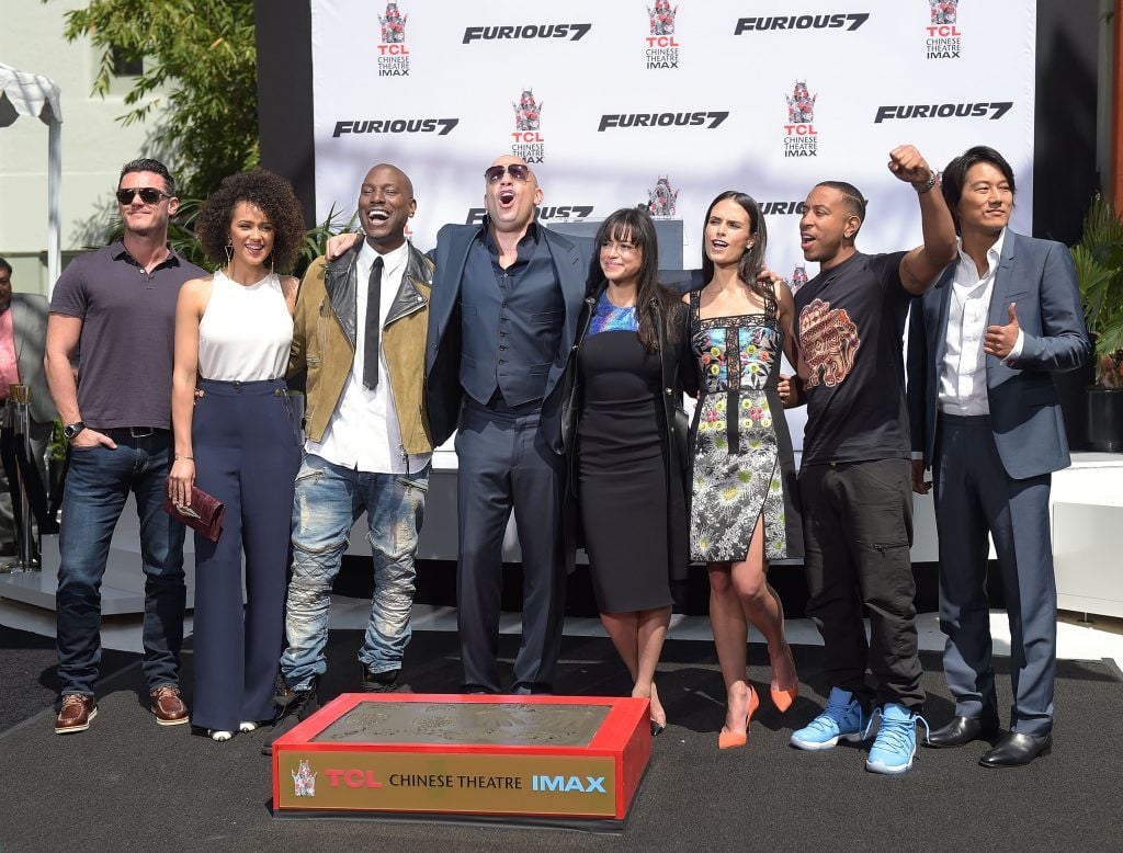 Lucas Black, Nathalie Emmanuel, Tyrese Gibson, Vin Diesel, Michelle Rodriguez, Jordana Brewster, Ludacris and Tatchakorn Yeerum attend Vin Diesel's hand and footprint ceremony at TCL Chinese Theatre IMAX on April 1, 2015 in Hollywood, California.  (Photo by Jason Kempin/Getty Images)