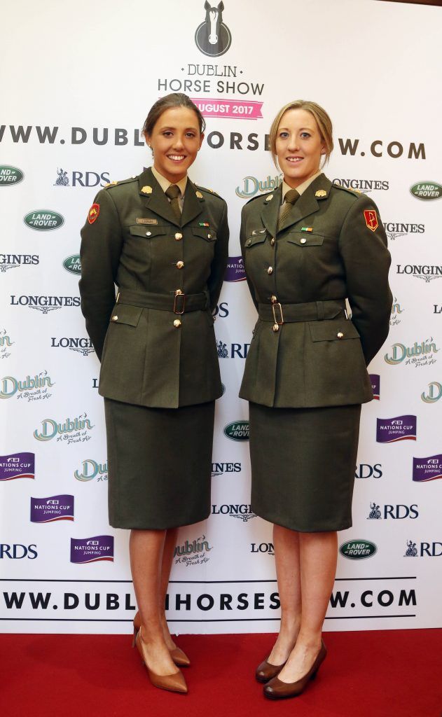 Lt. Jennifer Larken and Lt. Charlene Keogh pictured in Weir & Sons on Grafton Street at the social launch of this year's Dublin Horse Show which takes place in the RDS from August 9 - 13th. Photo: Leon Farrell / Photocall Ireland