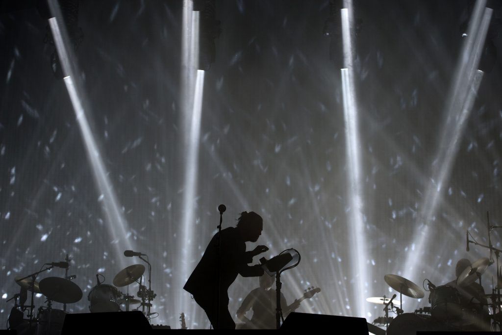 Radiohead perform on the Pyramid Stage at the Glastonbury Festival of Music and Performing Arts on Worthy Farm near the village of Pilton in Somerset, South West England, on June 23, 2017. (Photo by OLI SCARFF/AFP/Getty Images)