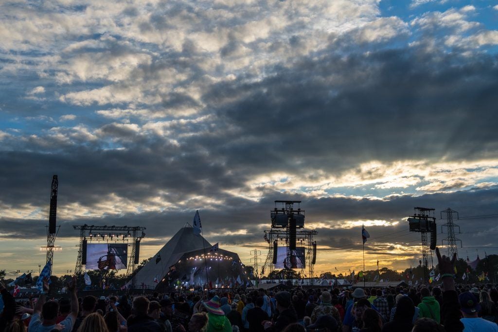 The sun sets as Biffy Clyro perform on the Pyramid Stage at Glastonbury Festival Site on June 25, 2017 in Glastonbury, England. (Photo by Chris J Ratcliffe/Getty Images)