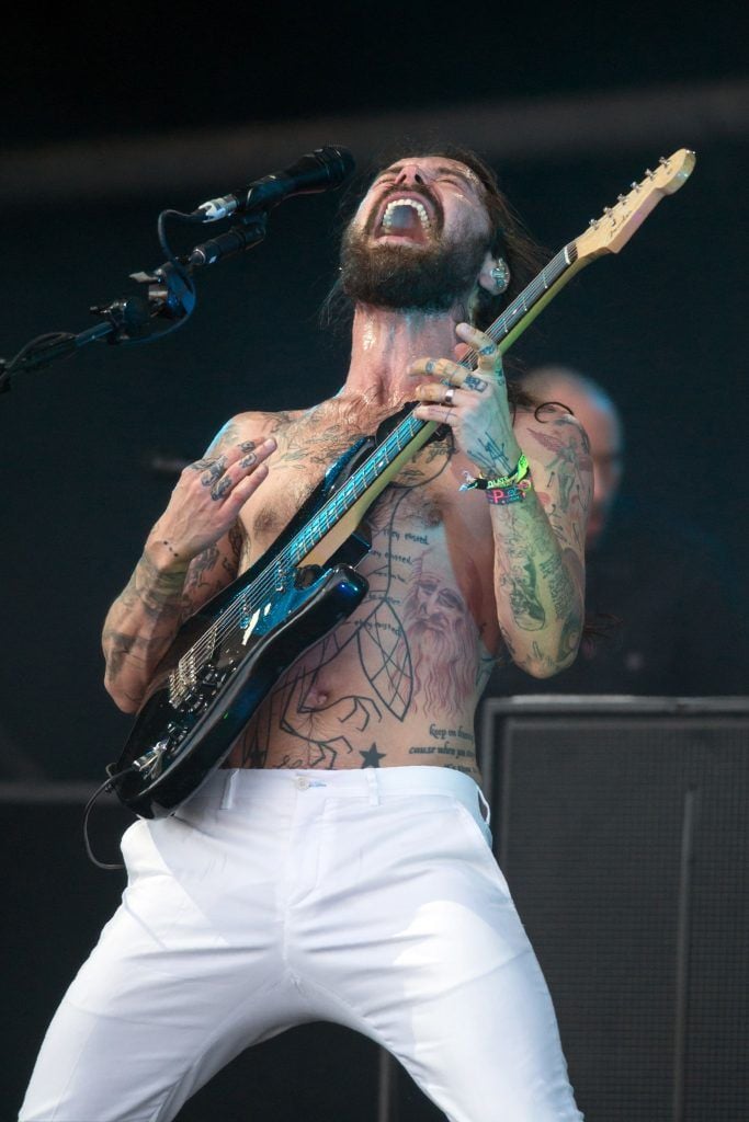 Simon Neil of Biffy Clyro performs on the Pyramid Stage at the Glastonbury Festival of Music and Performing Arts on Worthy Farm near the village of Pilton in Somerset, south-west England, on June 25, 2017. (Photo by OLI SCARFF/AFP/Getty Images)