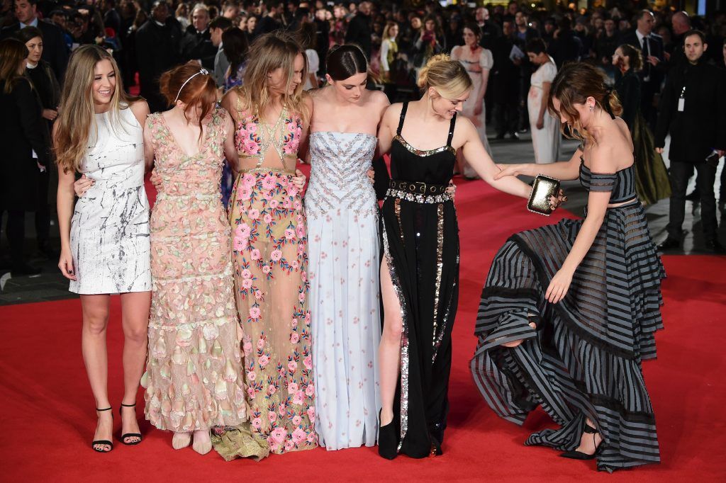 (L-R) British actress Hermione Corfield, British actress Ellie Bamber, British model and actress Suki Waterhouse, British actress Millie Brady, Australian actress Bella Heathcote and actress Lily James at the European premiere of Pride and Prejudice Zombies in London on February 1, 2016. / AFP / LEON NEAL        (Photo by LEON NEAL/AFP/Getty Images)