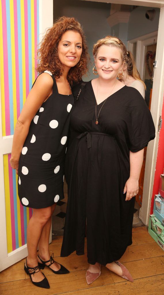 Cassandra Stavrou and Louise McSharry at the launch of Propercorn's new Find Your Flavour nail art menu at Tropical Popical, which features designs inspired by the colours and illustrations of the six Propercorn flavours. Photo: Leon Farrell/Photocall Ireland.