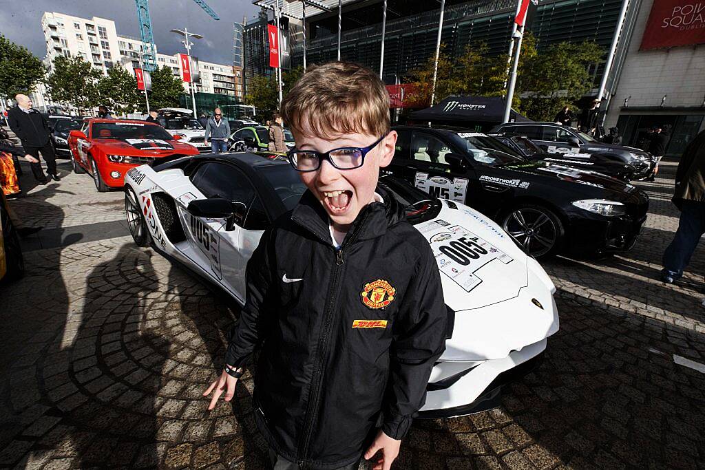 Darragh MCQuillan (9) from Finglas pictured at the start line of the supercar spectacle Cannonball 2017 in the Point Village, Dublin (8th September 2017). Picture by Andres Poveda