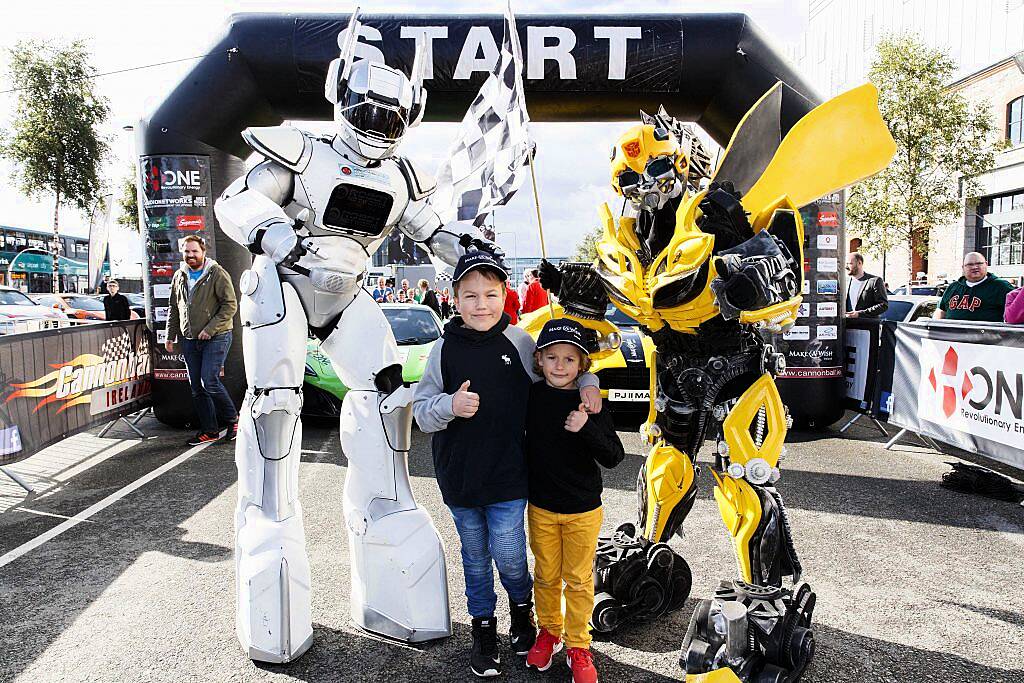 Make a Wish brothers Max (9) and Milo Purst (6) from Dublin at the start line of the supercar spectacle Cannonball 2017 in the Point Village, Dublin (8th September 2017). Picture by Andres Poveda