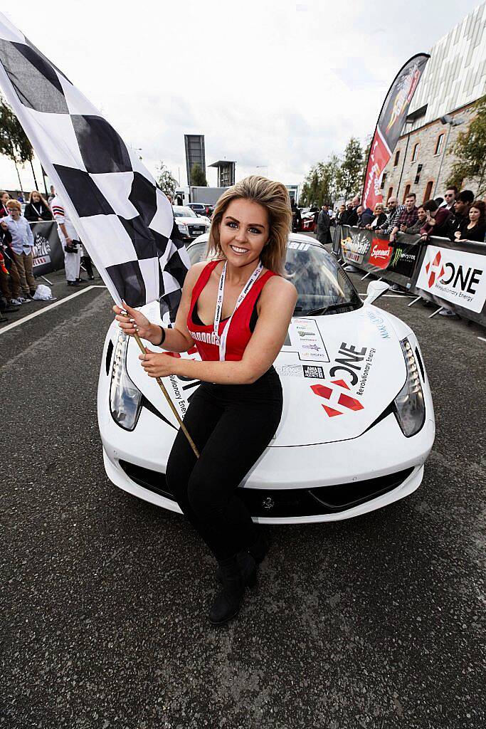 Gemma Parle pictured at the start line of the supercar spectacle Cannonball 2017 in the Point Village, Dublin (8th September 2017). Picture by Andres Poveda