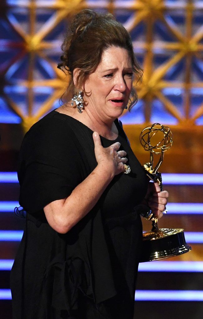 LOS ANGELES, CA - SEPTEMBER 17:  Actor Ann Dowd accepts the Outstanding Supporting Actress in a Drama Series for "The Handmaid's Tale" onstage during the 69th Annual Primetime Emmy Awards at Microsoft Theater on September 17, 2017 in Los Angeles, California.  (Photo by Kevin Winter/Getty Images)