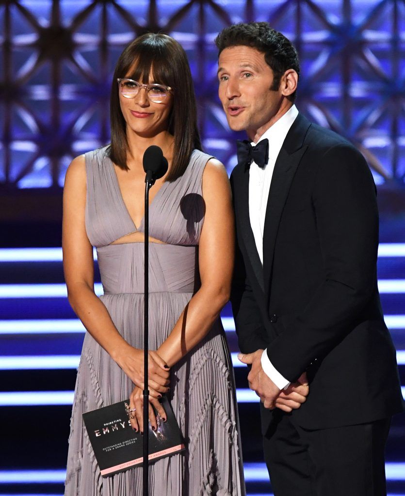 LOS ANGELES, CA - SEPTEMBER 17:  Actors Rashida Jones and Mark Feuerstein speak onstage during the 69th Annual Primetime Emmy Awards at Microsoft Theater on September 17, 2017 in Los Angeles, California.  (Photo by Kevin Winter/Getty Images)