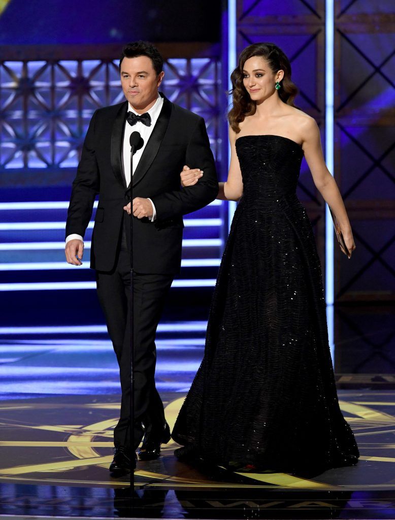 LOS ANGELES, CA - SEPTEMBER 17:  Actor/producer Seth MacFarlane (L) and actor Emmy Rossum speak onstage during the 69th Annual Primetime Emmy Awards at Microsoft Theater on September 17, 2017 in Los Angeles, California.  (Photo by Kevin Winter/Getty Images)
