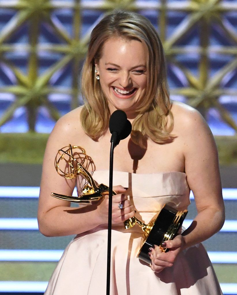 LOS ANGELES, CA - SEPTEMBER 17:  Actor Elisabeth Moss accepts Outstanding Lead Actress in a Drama Series for 'The Handmaid's Tale' onstage during the 69th Annual Primetime Emmy Awards at Microsoft Theater on September 17, 2017 in Los Angeles, California.  (Photo by Kevin Winter/Getty Images)