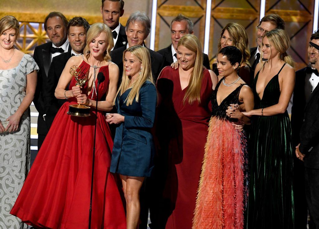 LOS ANGELES, CA - SEPTEMBER 17:  Actors Nicole Kidman and Reese Witherspoon (both at microphone) with cast and crew of 'Big Little Lies' accept the Outstanding Limited Series award onstage during the 69th Annual Primetime Emmy Awards at Microsoft Theater on September 17, 2017 in Los Angeles, California.  (Photo by Kevin Winter/Getty Images)
