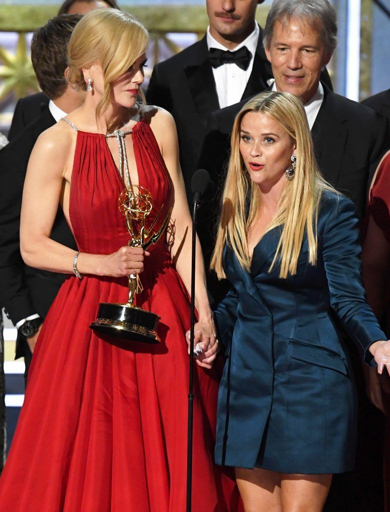 LOS ANGELES, CA - SEPTEMBER 17:  Actors Nicole Kidman and Reese Witherspoon with cast and crew of 'Big Little Lies' accept the Outstanding Limited Series award onstage during the 69th Annual Primetime Emmy Awards at Microsoft Theater on September 17, 2017 in Los Angeles, California.  (Photo by Kevin Winter/Getty Images)