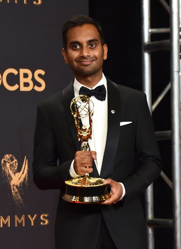 LOS ANGELES, CA - SEPTEMBER 17:  Aziz Ansari poses with the award for Outstanding Writing for a Comedy Series for 'Master of None' during the 69th Annual Primetime Emmy Awards at Microsoft Theater on September 17, 2017 in Los Angeles, California.  (Photo by Alberto E. Rodriguez/Getty Images)