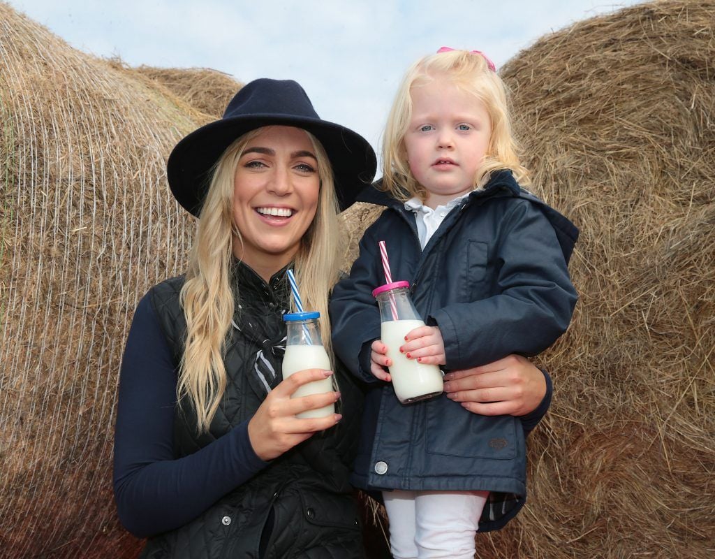 Jean Spillane and Ava O Malley join in the fun with the National Dairy Council at the National Ploughing Championships 2017 in Screggan Tullamore, Offaly. Photo by Brian McEvoy