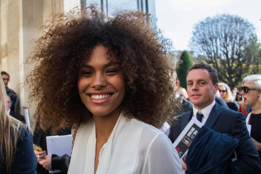Italian model Tina Kunakey arrives before the Christian Dior women's 2018 Spring/Summer ready-to-wear collection fashion show in Paris, on September 26, 2017.      (Photo by -/AFP/Getty Images)