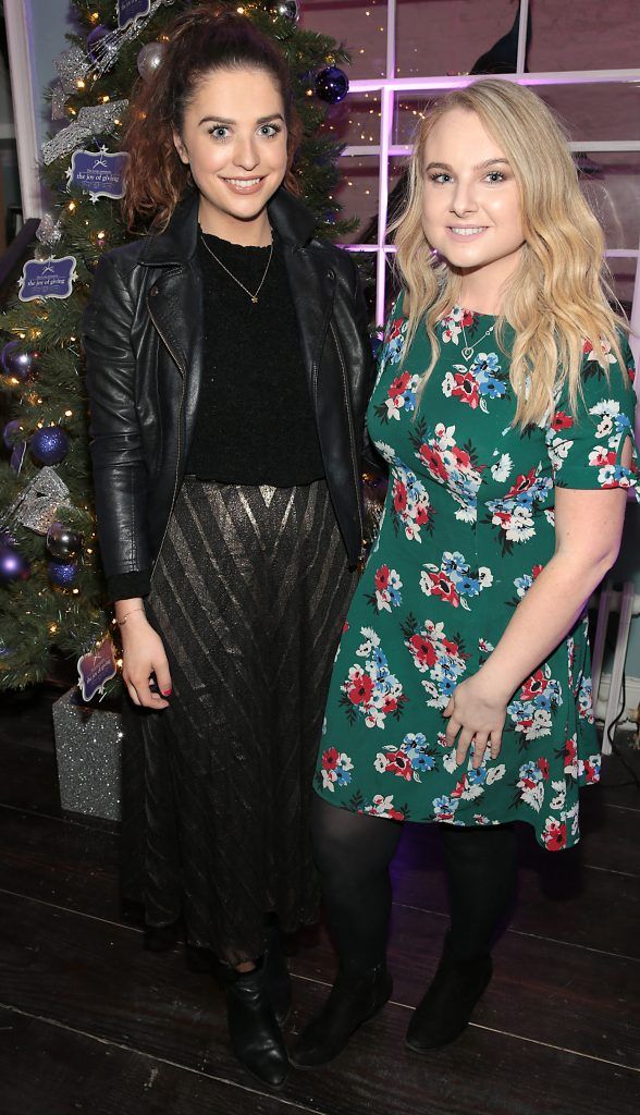 Niamh Devereux and Victoria Stone at the Loop at Dublin and Cork Airports Joy of Giving Christmas Preview at Number 4 Parliament Street. Picture: Brian McEvoy
