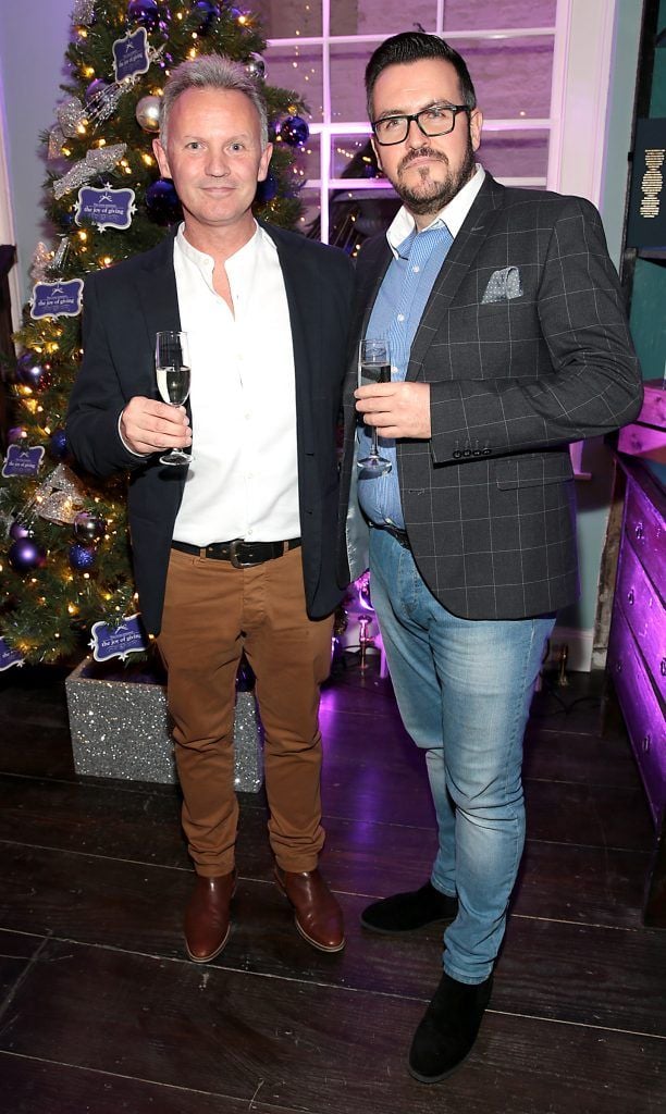 Martin Carpenter and Clyde Carroll at the Loop at Dublin and Cork Airports Joy of Giving Christmas Preview at Number 4 Parliament Street. Picture: Brian McEvoy