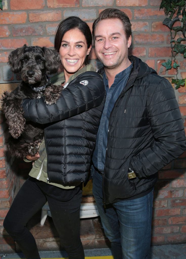 Glenda Gilson and husband Rob McNaughton and dog Yaz t the launch of Andrea Hayes' book Dog Tales at House in Leeson Street, Dublin. Pic: Brian McEvoy