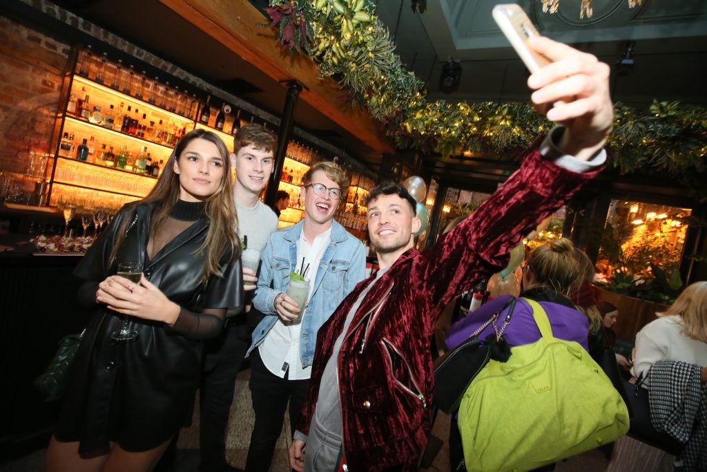 Pictured are, from left, Kelly Horrigan, Aaron Hurley, Andrew McLoughlin and James Kavanagh at the Spotlight Whitening Launch event on 26th October at Nolita, George’s Street. PHOTO: Mark Stedman