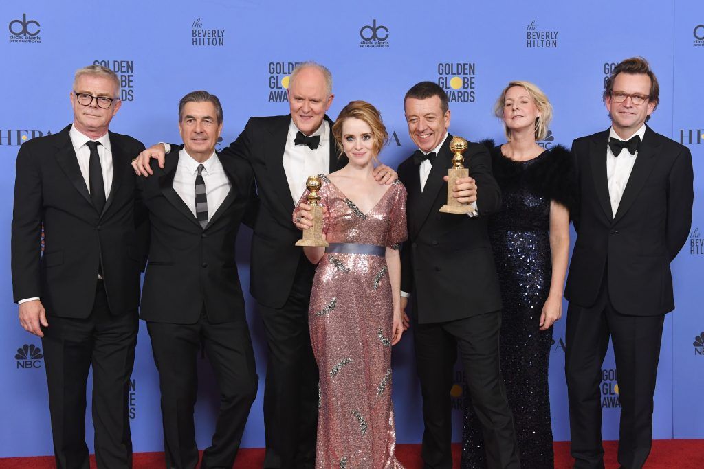 (L-R) Cast and crew of 'The Crown,' winner of Best Series - Drama, pose in the press room during the 74th Annual Golden Globe Awards at The Beverly Hilton Hotel on January 8, 2017 in Beverly Hills, California.  (Photo by Kevin Winter/Getty Images)
