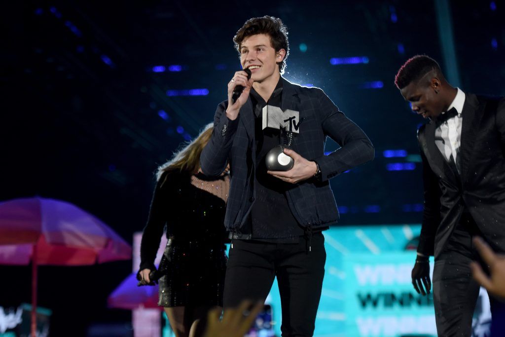 Shawn Mendez wins the award for Best Song, 'There's Nothing Holdin' Me Back' at the MTV EMAs 2017 held at The SSE Arena, Wembley on November 12, 2017 in London, England.  (Photo by Dave J Hogan/Getty Images for MTV)