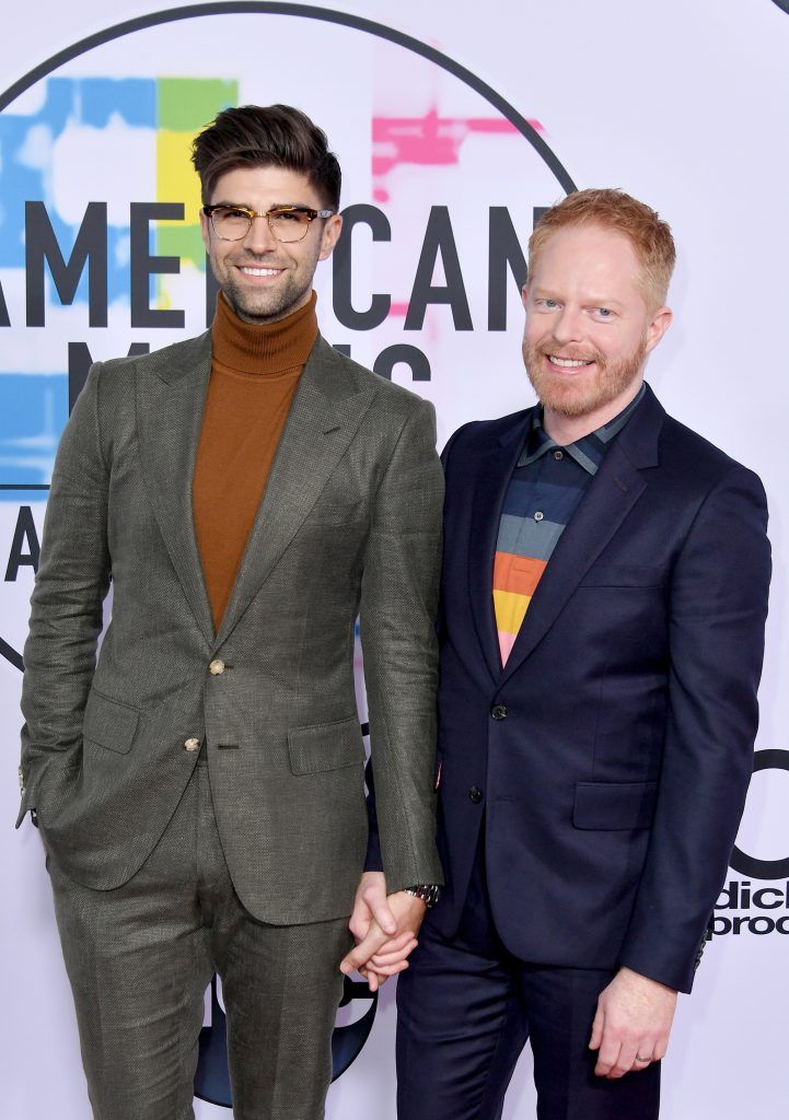 Justin Mikita (L) and Jesse Tyler Ferguson attend the 2017 American Music Awards at Microsoft Theater on November 19, 2017 in Los Angeles, California.  (Photo by Neilson Barnard/Getty Images)