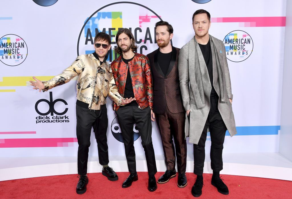 (L-R) Ben McKee, Daniel Wayne Sermon, Daniel Platzman and Dan Reynolds of Imagine Dragons attend the 2017 American Music Awards at Microsoft Theater on November 19, 2017 in Los Angeles, California.  (Photo by Neilson Barnard/Getty Images)