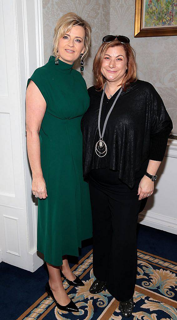 Sharon O Reilly and  Sharon Gunn at the annual Cari Charity Christmas lunch hosted by Miriam Ahern at the Shelbourne Hotel Dublin. Photo: Brian McEvoy