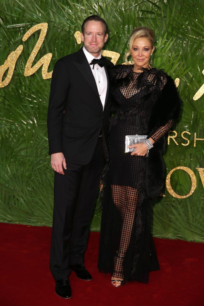 Rupert Adams (L) and Nadja Swarovski (R) pose on the red carpet upon arrival to attend the British Fashion Awards 2017 in London on December 4, 2017. (Photo by Daniel Leal-Olivas/AFP/Getty Images)