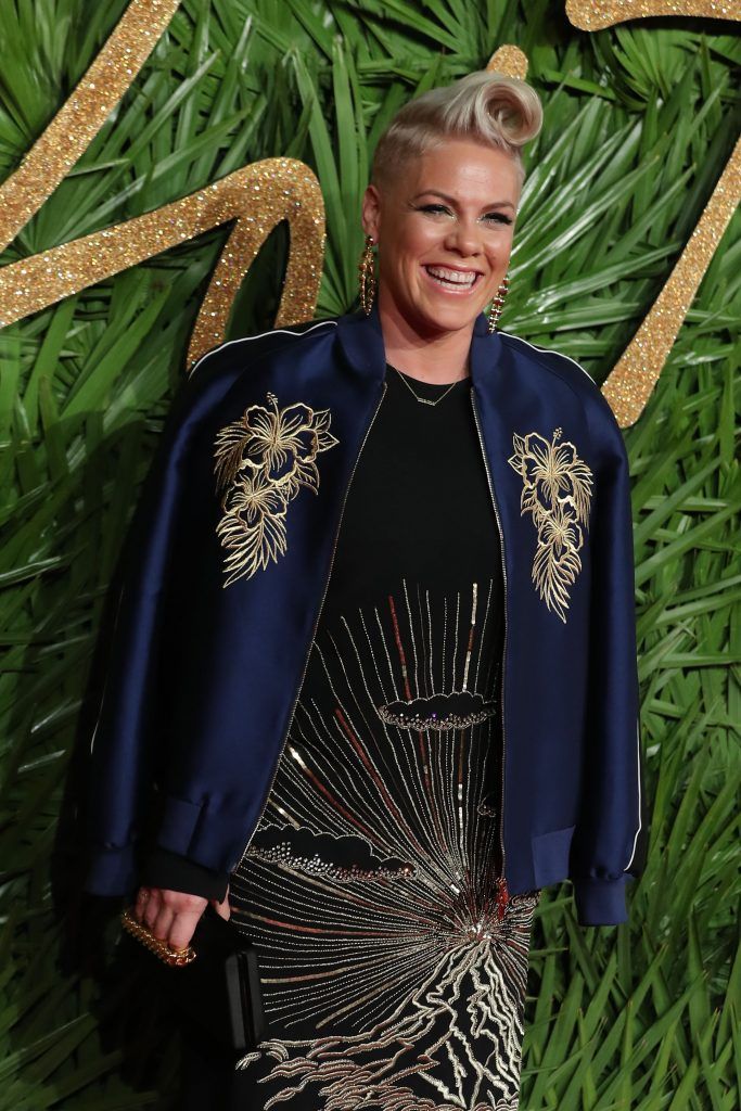 American singer Pink poses on the red carpet upon arrival to attend the British Fashion Awards 2017 in London on December 4, 2017. (Photo by Daniel Leal-Olivas/AFP/Getty Images)