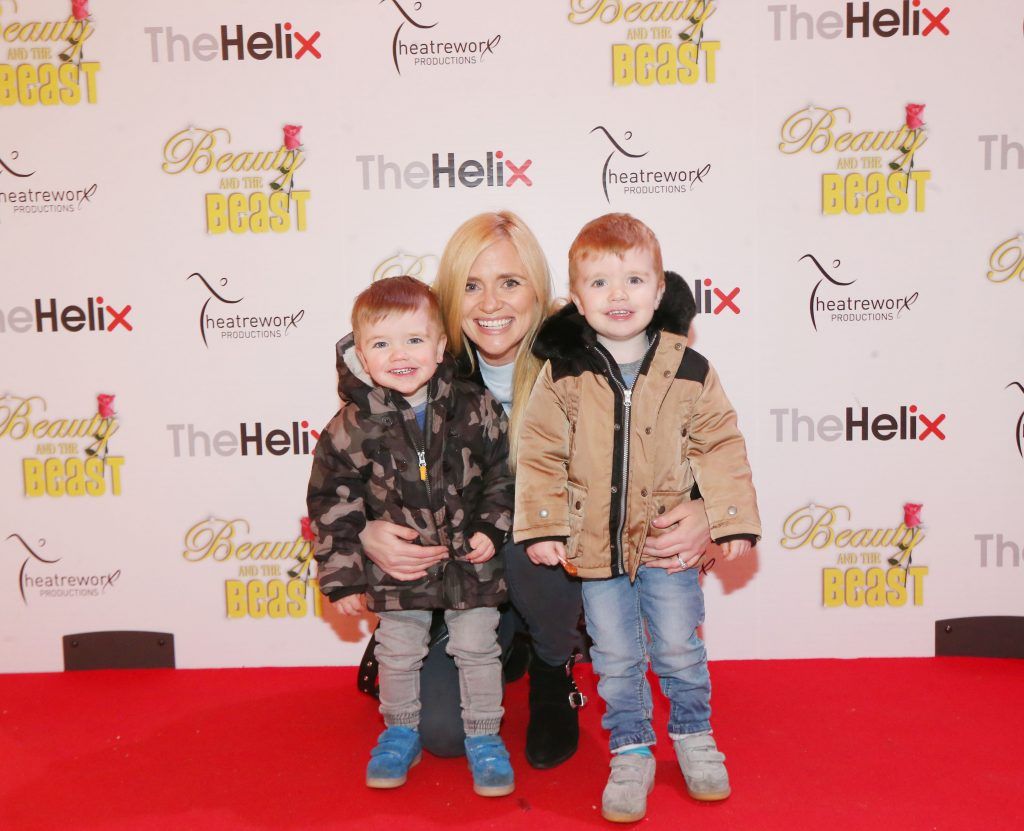 Karen Koster pictured with her children Finn and JJ pictured with her children Finn and JJ at the opening night of The Helix Pantomime, Beauty and the Beast. Photo: Leon Farrell/Photocall Ireland