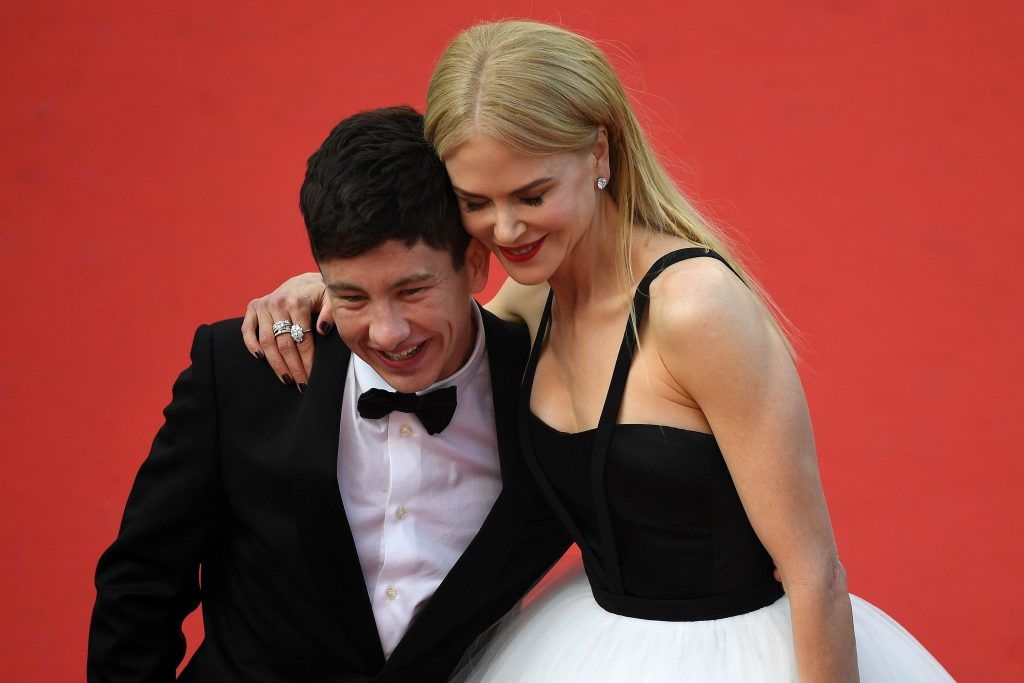 Barry Keoghan (L) and Nicole Kidman pose as they arrive on May 22, 2017 for the screening of the film 'The Killing of a Sacred Deer' at the 70th edition of the Cannes Film Festival in Cannes, southern France. (Photo by ANTONIN THUILLIER/AFP/Getty Images)