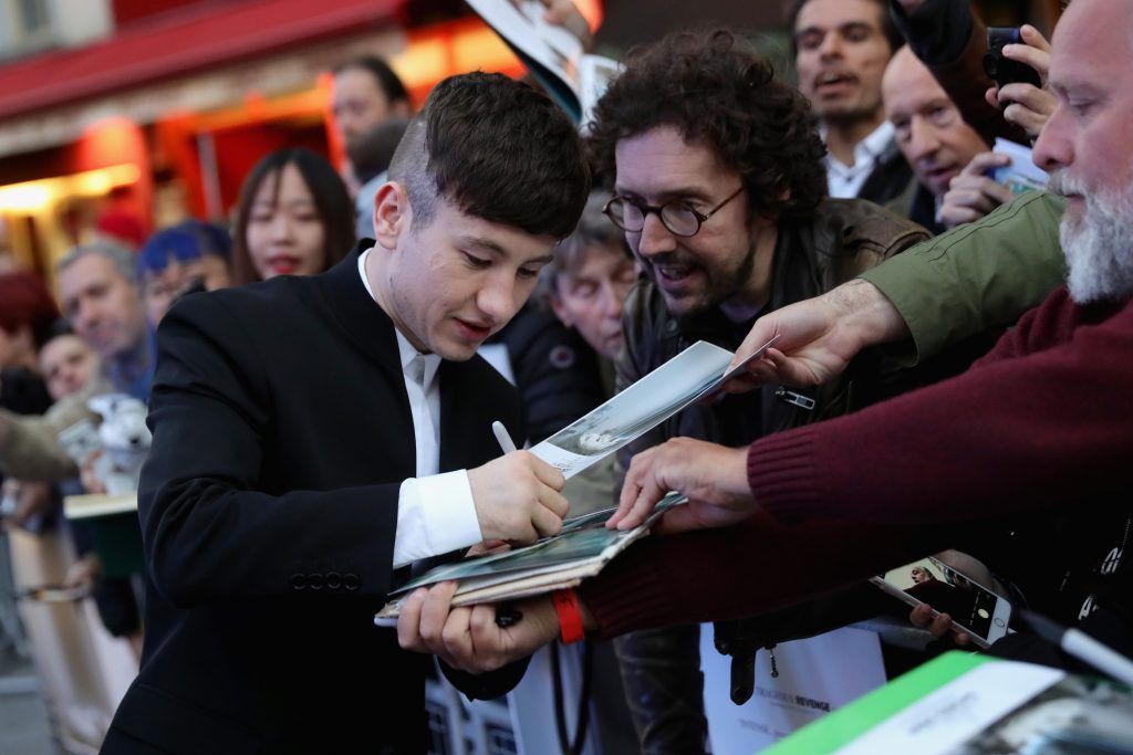 Barry Keoghan signs autographs for fans as he attends the Headline Gala Screening & UK Premiere of "Killing of a Sacred Deer" during the 61st BFI London Film Festival on October 12, 2017 in London, England.  (Photo by Vittorio Zunino Celotto/Getty Images for BFI)
