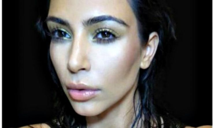 Kim K Goes All Out on Twitter With 'Book of Selfies' Cover and 'Furkini'