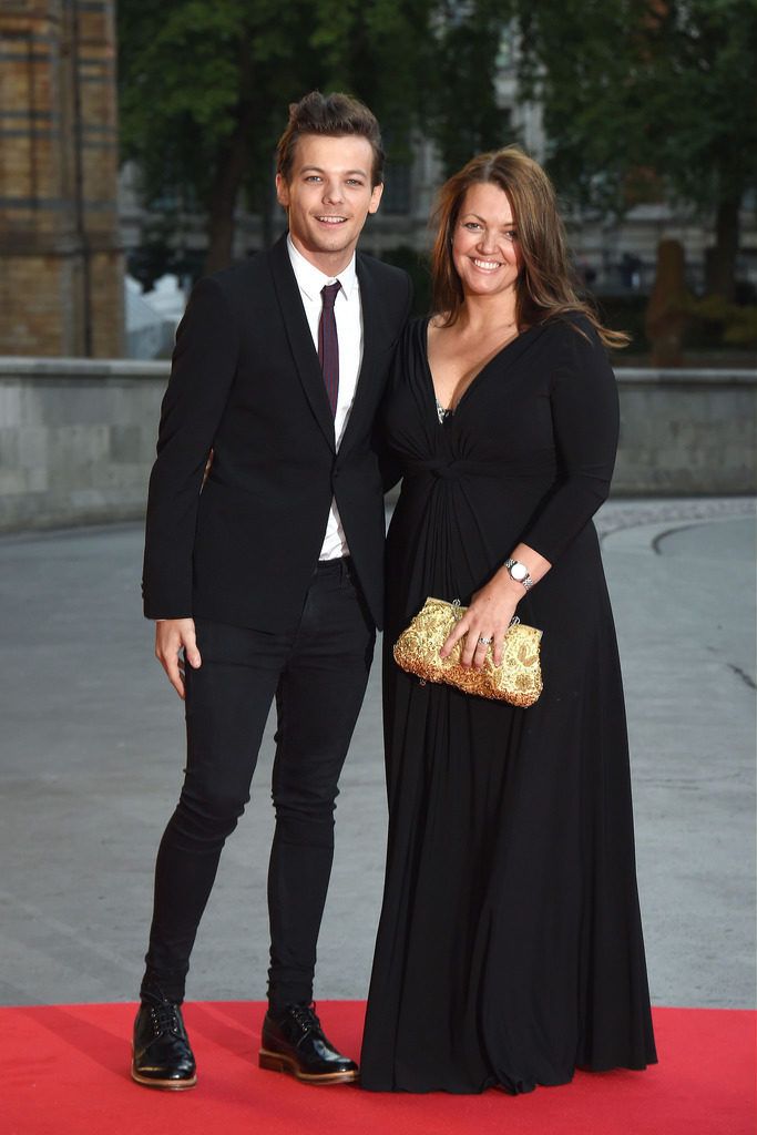 LONDON, ENGLAND - AUGUST 10:  Louis Tomlinson and Johannah Poulston attend the Believe in Magic Cinderella Ball at Natural History Museum on August 10, 2015 in London, England.  (Photo by Stuart C. Wilson/Getty Images)