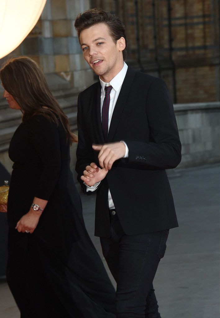 LONDON, ENGLAND - AUGUST 10:  Louis Tomlinson attends the Believe in Magic Cinderella Ball at Natural History Museum on August 10, 2015 in London, England.  (Photo by Stuart C. Wilson/Getty Images)