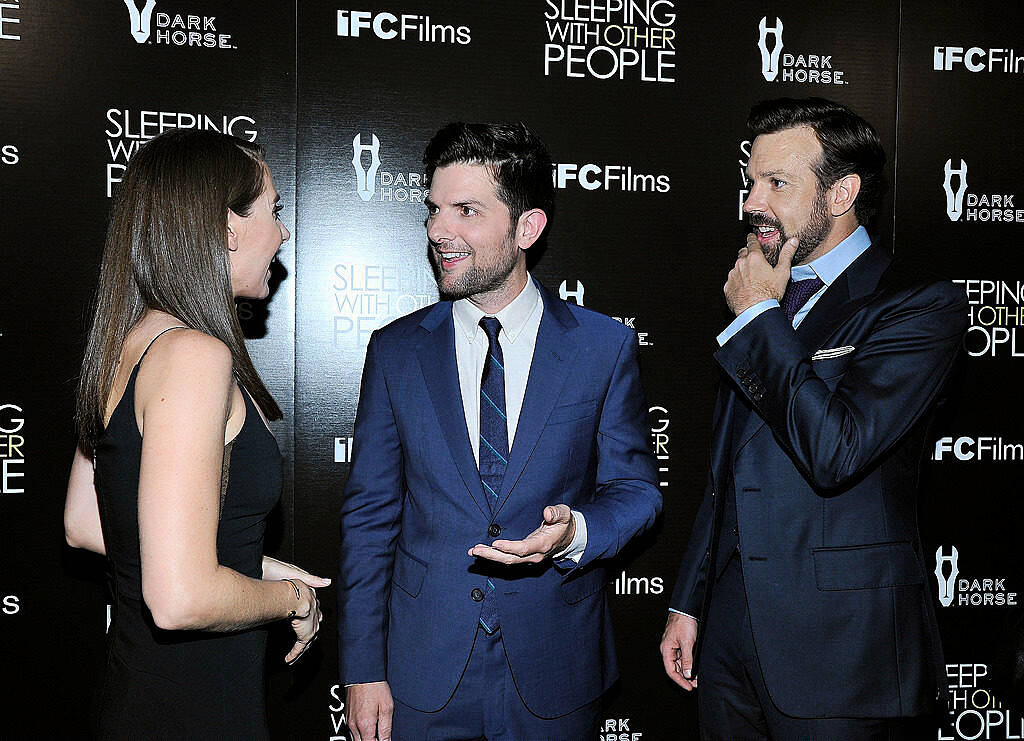 LOS ANGELES, CA - SEPTEMBER 09:  (L-R) Actors Alison Brie, Adam Scott and Jason Sudeikis attend the Los Angeles premiere of IFC Films "Sleeping with Other People" presented by Dark Horse Wine on September 9, 2015 in Los Angeles, California.  (Photo by John Sciulli/Getty Images for Darin Pfeiffer Consulting)