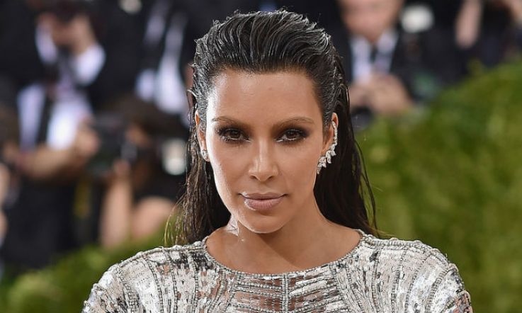 Kim Kardashian West 'shaken but physically unharmed' after being robbed at gunpoint in Paris