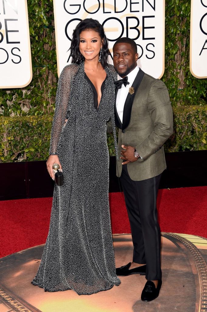 BEVERLY HILLS, CA - JANUARY 10:  Actor Kevin Hart (R) and Eniko Parrish attend the 73rd Annual Golden Globe Awards held at the Beverly Hilton Hotel on January 10, 2016 in Beverly Hills, California.  (Photo by Jason Merritt/Getty Images)