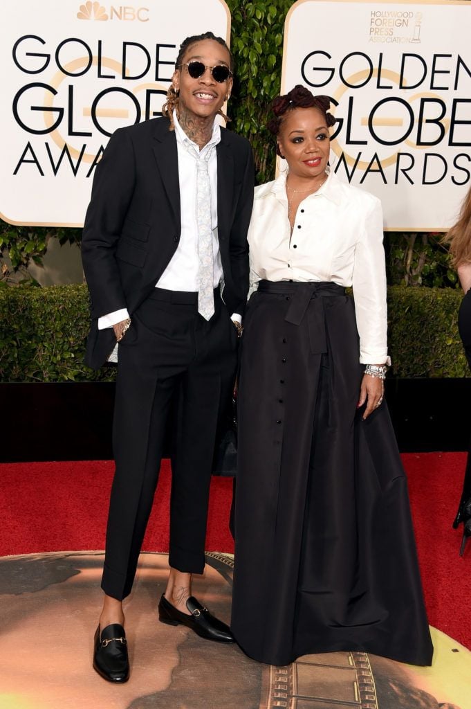 BEVERLY HILLS, CA - JANUARY 10:  Rapper Wiz Khalifa and Peachie Wimbush attend the 73rd Annual Golden Globe Awards held at the Beverly Hilton Hotel on January 10, 2016 in Beverly Hills, California.  (Photo by Jason Merritt/Getty Images)