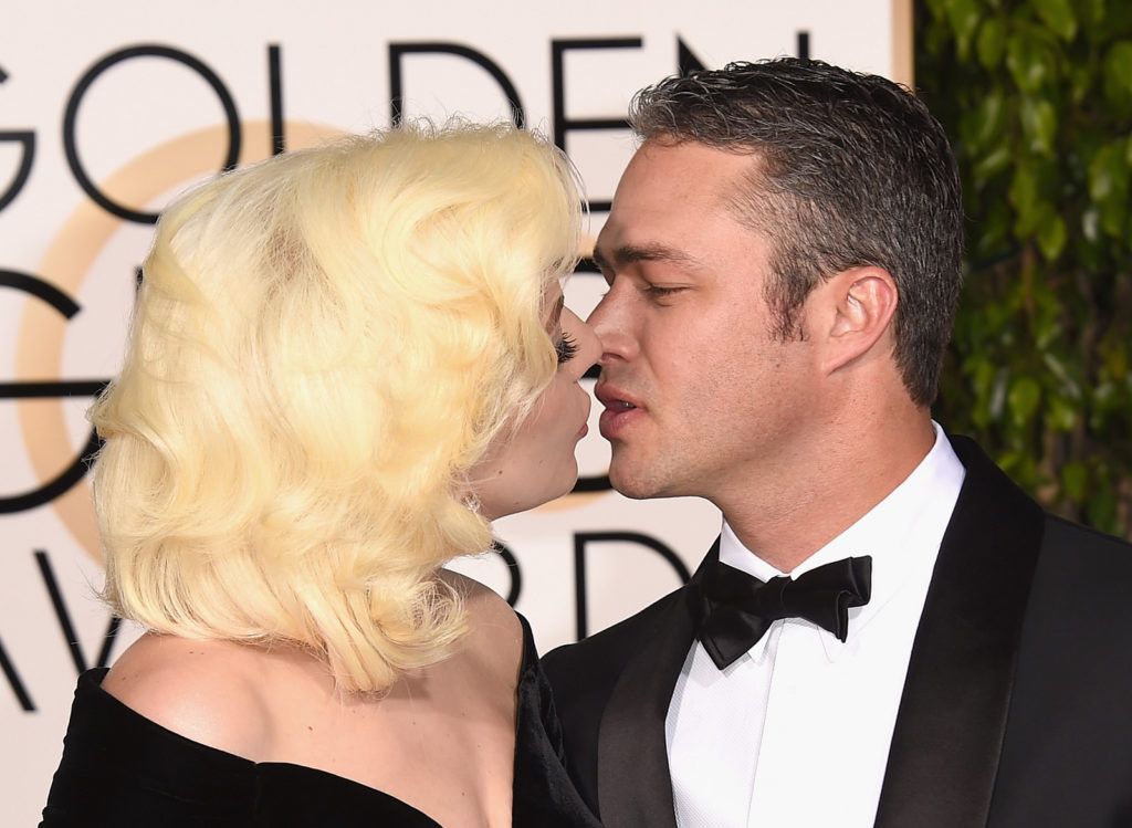 BEVERLY HILLS, CA - JANUARY 10:  Singer/actress Lady Gaga and actor Taylor Kinney attend the 73rd Annual Golden Globe Awards held at the Beverly Hilton Hotel on January 10, 2016 in Beverly Hills, California.  (Photo by Jason Merritt/Getty Images)