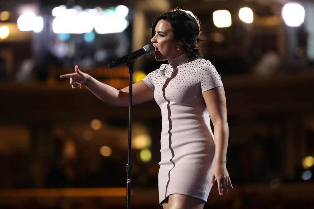 Singer Demi Lovato performs on stage during the first day of the Democratic National Convention at the Wells Fargo Center, July 25, 2016 (Photo by Chip Somodevilla/Getty Images)