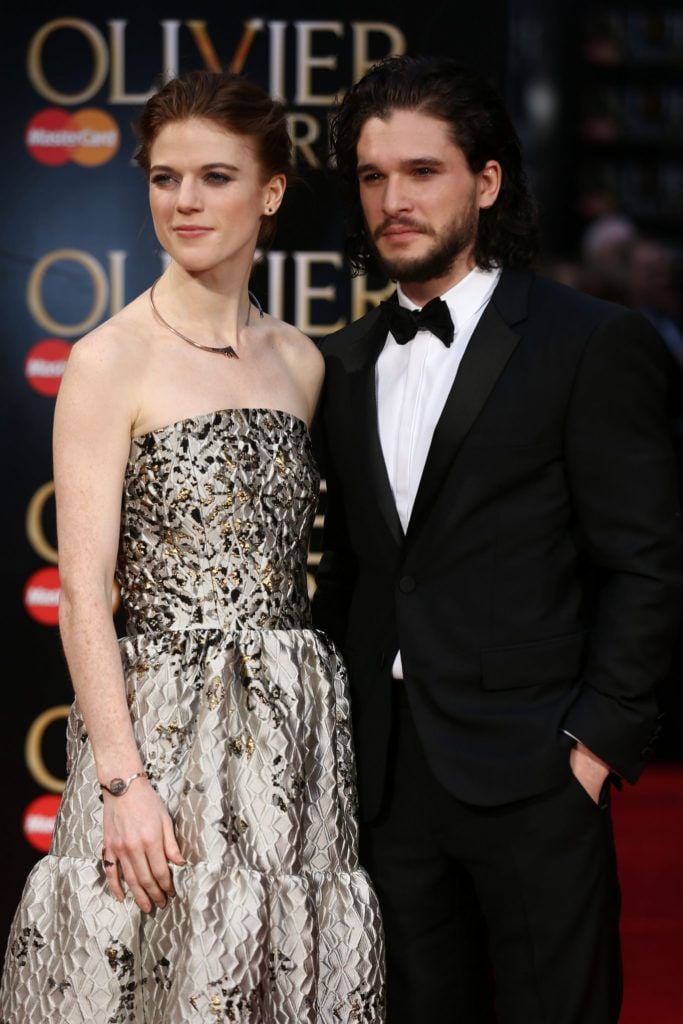 British actor Kit Harington (R) and British actress Rose Leslie (L) pose on the red carpet upon arrival to attend the 2016  Laurence Olivier Awards in London on April 3, 2016. / AFP / JUSTIN TALLIS        (Photo credit should read JUSTIN TALLIS/AFP/Getty Images)